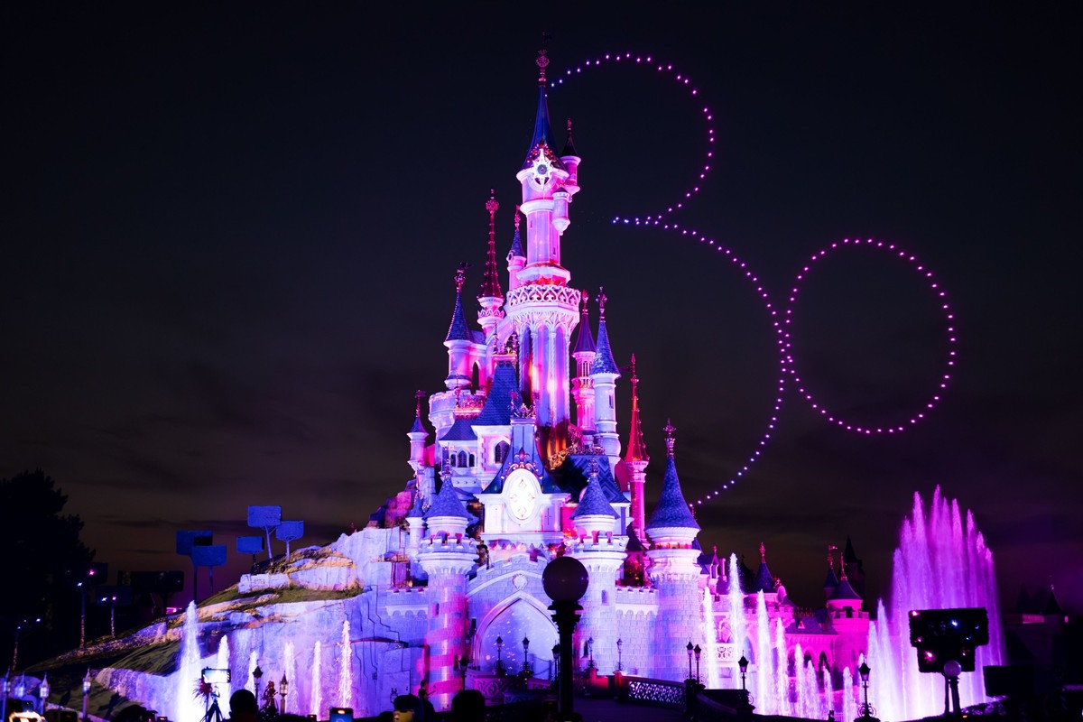 RECORD DATE NOT STATED A stunning night shot of the iconic Disneyland castle lit up with vibrant colors 21804213