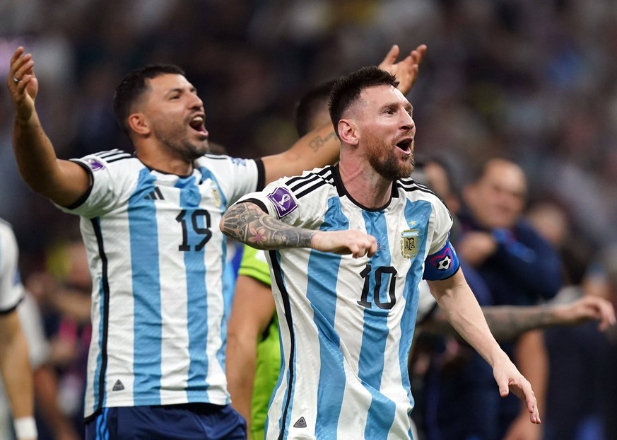 Argentina v France - FIFA World Cup, WM, Weltmeisterschaft, Fussball 2022 - Final - Lusail Stadium Argentina s Lionel Messi celebrates victory over France to win the FIFA World Cup with former player  ...