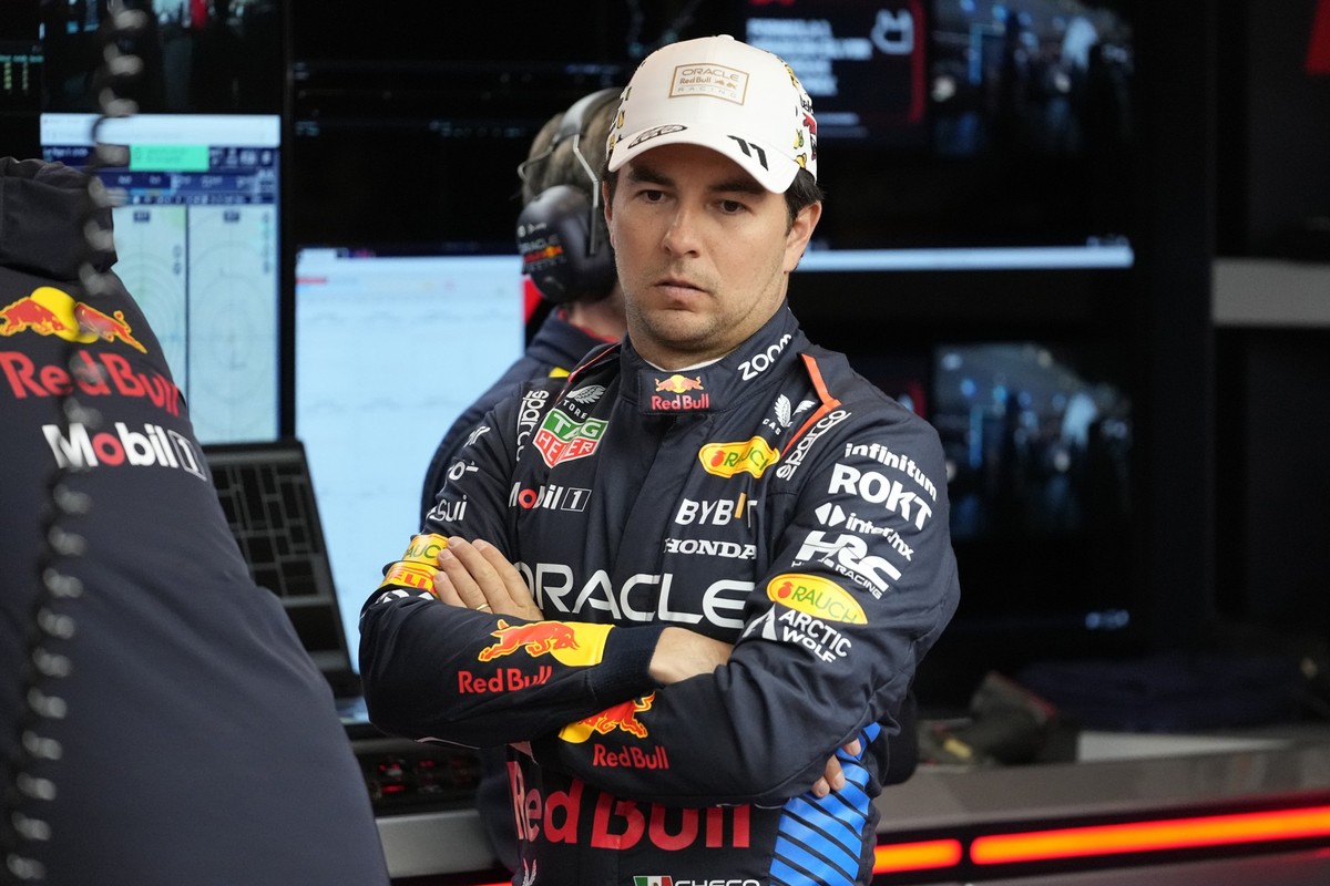 FILE - Red Bull driver Sergio Perez, of Mexico, waits in the garage area prior to a practice session for the Formula One U.S. Grand Prix auto race, Thursday, Nov. 21, 2024, in Las Vegas. (AP Photo/Mat ...