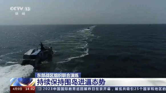 FILE - In this image made from video footage made available Sunday, April 9, 2023, by China&#039;s CCTV, Chinese navy ships take part in a military drill in the Taiwan Strait. China’s military sent se ...