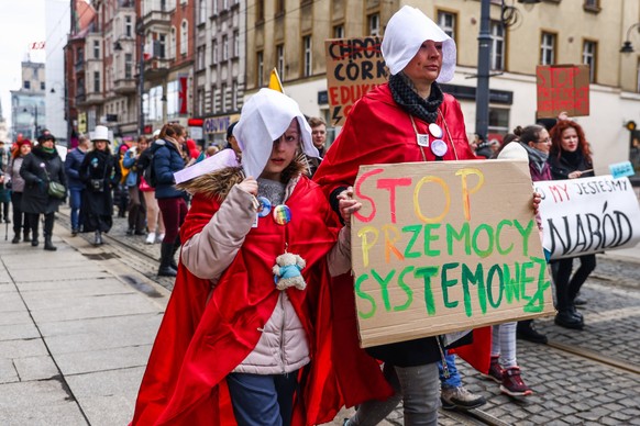 Manifa Feminist March In Poland A woman and a girl wearing The Handmaid s Tale inspired costumes attend an annual Silesian Manifa march in Katowice, Poland on March 12, 2023. This year s 15th edition  ...