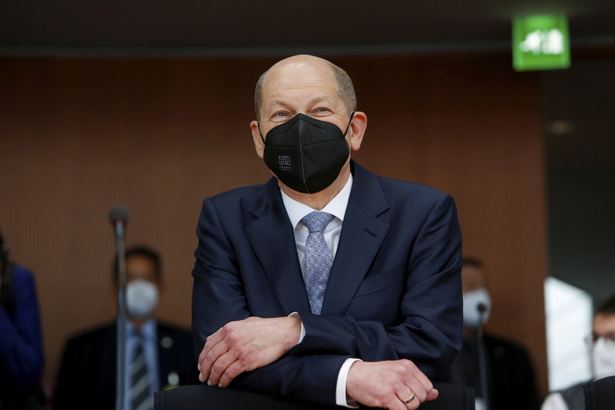 German Finance Minister Olaf Scholz looks on as he arrives to testify before a parliament committee investigating Wirecard, in Berlin, Germany, Thursday, April 22, 2021. (Michele Tantussi/AP via Pool)