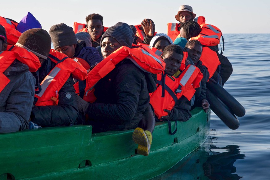 February 15, 2023, Sar Malta, Malta: A group of 31 migrants from Ivory Coast, Senegal and Guinea Conakry are given life jackets and await directions from the Aita Mari boat rescue team to safety. On W ...