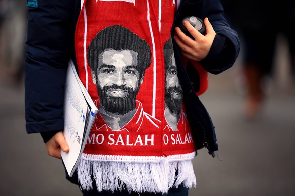 Brighton and Hove Albion v Liverpool - Premier League - AMEX Stadium A young Liverpool fan wearing a scarf featuring Liverpool s Mohamed Salah EDITORIAL USE ONLY No use with unauthorised audio, video, ...