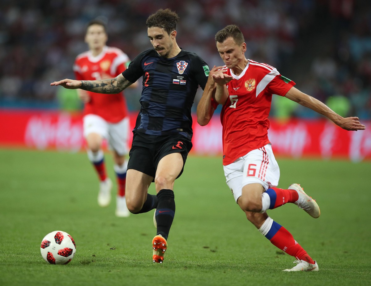 (180707) -- SOCHI, July 7, 2018 -- Denis Cheryshev (R) of Russia vies with Sime Vrsaljko of Croatia during the 2018 FIFA World Cup WM Weltmeisterschaft Fussball quarter-final match between Russia and ...