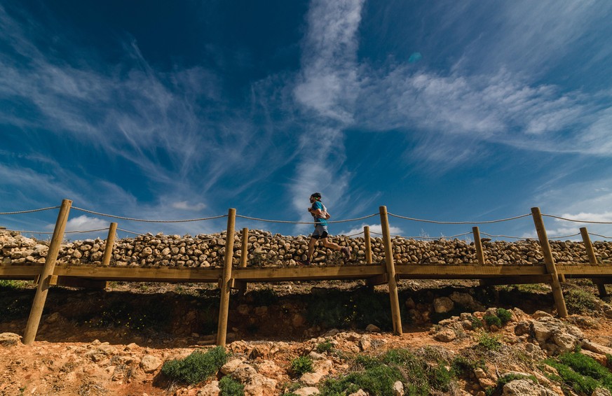 May 22, 2021, Menorca, Spain: A trail runner participates at the 2nd day in the Menorca Trail Cami de Cavalls around the Balearic Island, one of the longest in Europe. Due to the COVID-19 crisis, the  ...