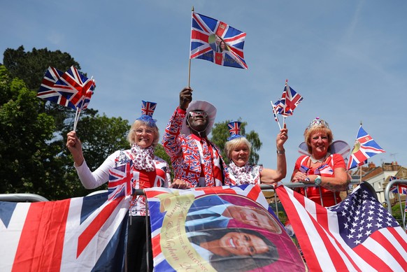 May 18, 2018 - London, London, UK - London, UK. Royal fans gather on the Long Walk by Windsor Castle on the eve of the Royal Wedding. Prince Harry and Meghan Markle are to be married in Windsor tomorr ...