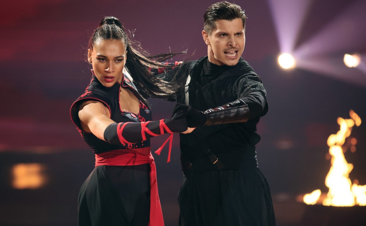 COLOGNE, GERMANY - MARCH 07: Marie Mouroum and Alexandru Ionel perform on stage during the second show of the 18th season of the television competition show &quot;Let&#039;s Dance&quot; at MMC Studios ...