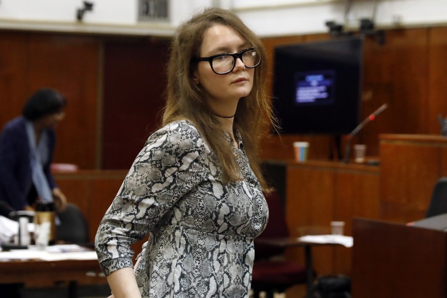 Anna Sorokin leaves during the lunch break at her trial in New York State Supreme Court, in New York, Monday, April 22, 2019. Sorokin, who claimed to be a German heiress, is on trial on grand larceny  ...