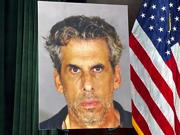 A photo of TV producer Eric Weinberg is displayed before a news conference to announce sexual assault charges against Weinberg on Wednesday, Oct. 5, 2022 in Los Angeles. (AP Photo/Christopher Weber)