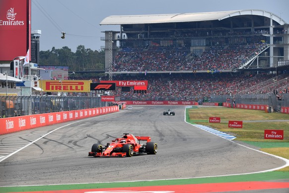 Sebastian VETTEL,GER (Scuderia Ferrari), Aktion in seinem Rennwagen,fuehrt das Feld an vor Valtteri BOTTAS (FIN,Mercedes AMG Petronas Motorsport) im vorerst letzten Rennen auf dem Hockenheim Ring, For ...