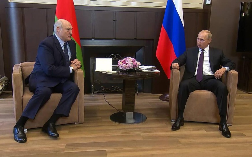 SOCHI, RUSSIA - SEPTEMBER 14, 2020: Belarus President Alexander Lukashenko L and Russia s President Vladimir Putin during a meeting at Bocharov Ruchei residence. Video screen grab. Russian Presidentia ...