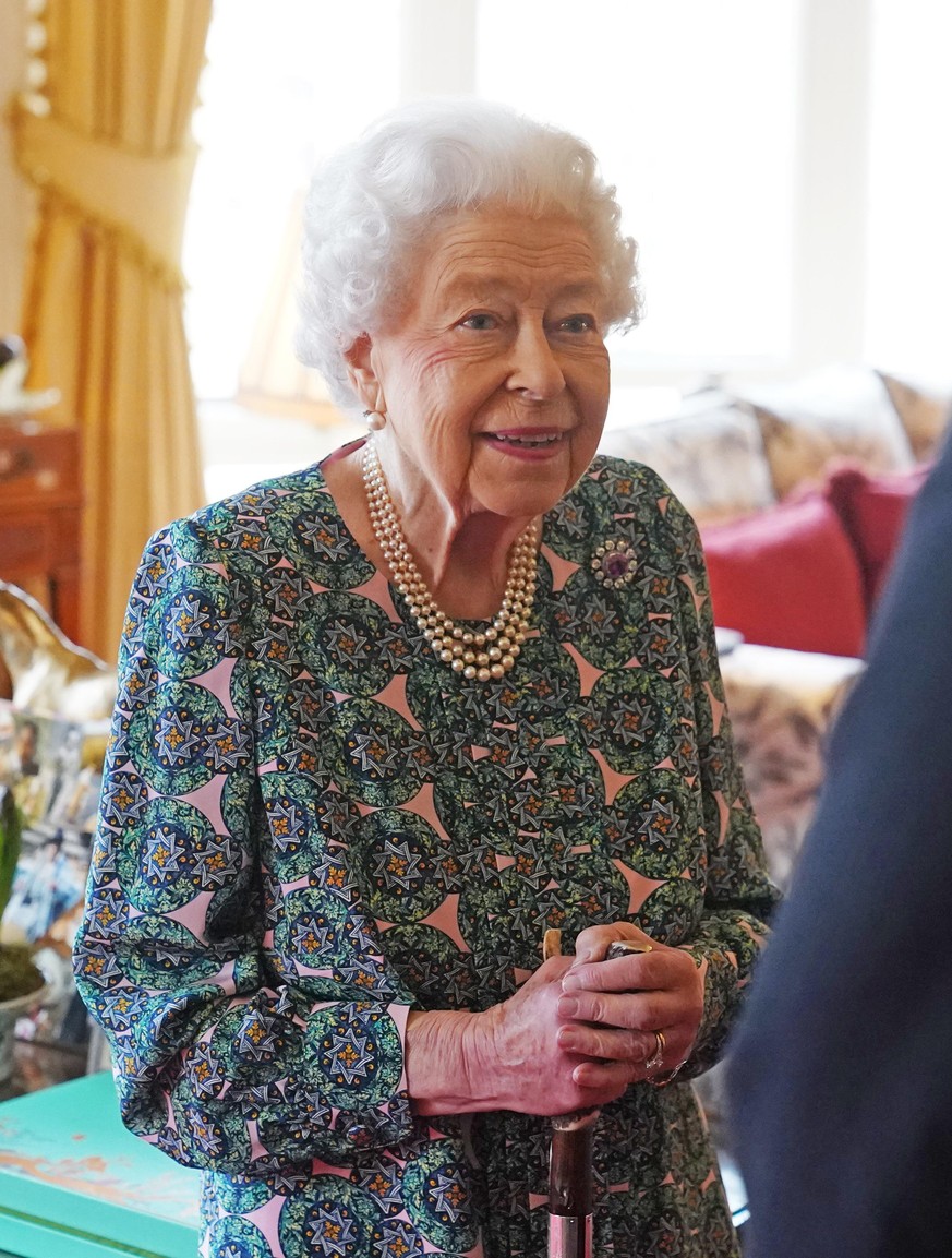 Queen Elizabeth II tests positive for Covid-19. File photo dated 16/02/22/ of Queen Elizabeth II speaking during an audience at Windsor Castle. The Queen has tested positive for Covid-19 and is experi ...