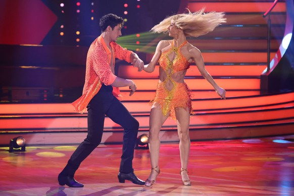 COLOGNE, GERMANY - MAY 13: René Casselly and Kathrin Menzinger perform on stage during the 11th show of the 15th season of the television competition show &quot;Let&#039;s Dance&quot; at MMC Studios o ...