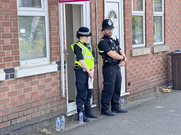 NOTTINGHAM, UNITED KINGDOM - JUNE 13: Police take security measures at the scene in Nottingham, United Kingdom on June 13, 2023. Three people have been found dead and a man has been arrested after pol ...