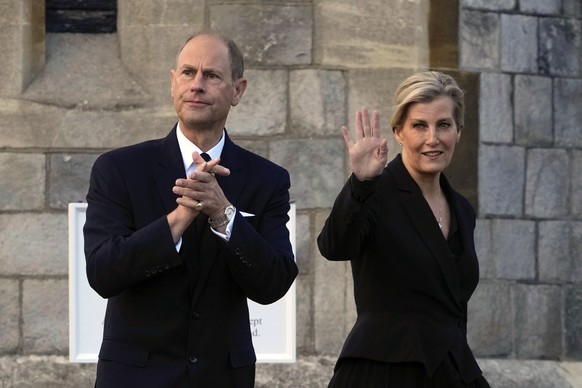 FILE - Britain&#039;s Prince Edward and Sophie, Countess of Wessex, wave to mourners outside the Windsor Castle in Windsor, England, on Sept. 16, 2022. Britain’s King Charles III has made his youngest ...