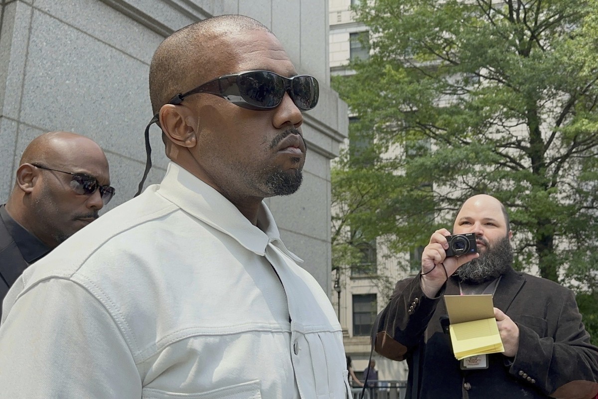 Ye, the rapper formerly known as Kanye West, leaves federal court during the trial of Sean &quot;Diddy&quot; Combs in New York, Friday, June 13, 2025. (AP Photo/Larry Neumeister)