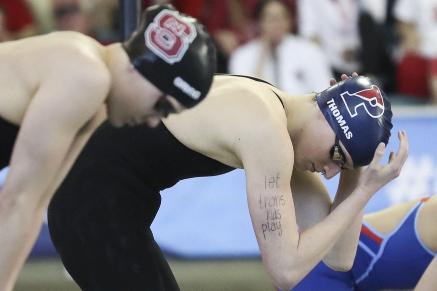 Thomas wrote âlet trans kids playâ on her arm before racing in the 100-yard freestyle in the final night of the NCAA Championship. March 21, 2022. Photo by The Philadelphia Inquirer/TNS/ABACAPRESS ...