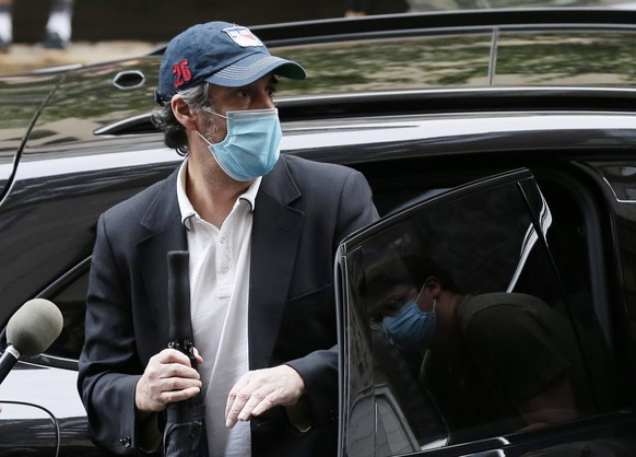 President Donald Trump s former attorney Michael Cohen arrives to his home in New York City on Friday, July 24, 2020. A federal judge in New York found that he was sent back to prison as a retaliatory ...