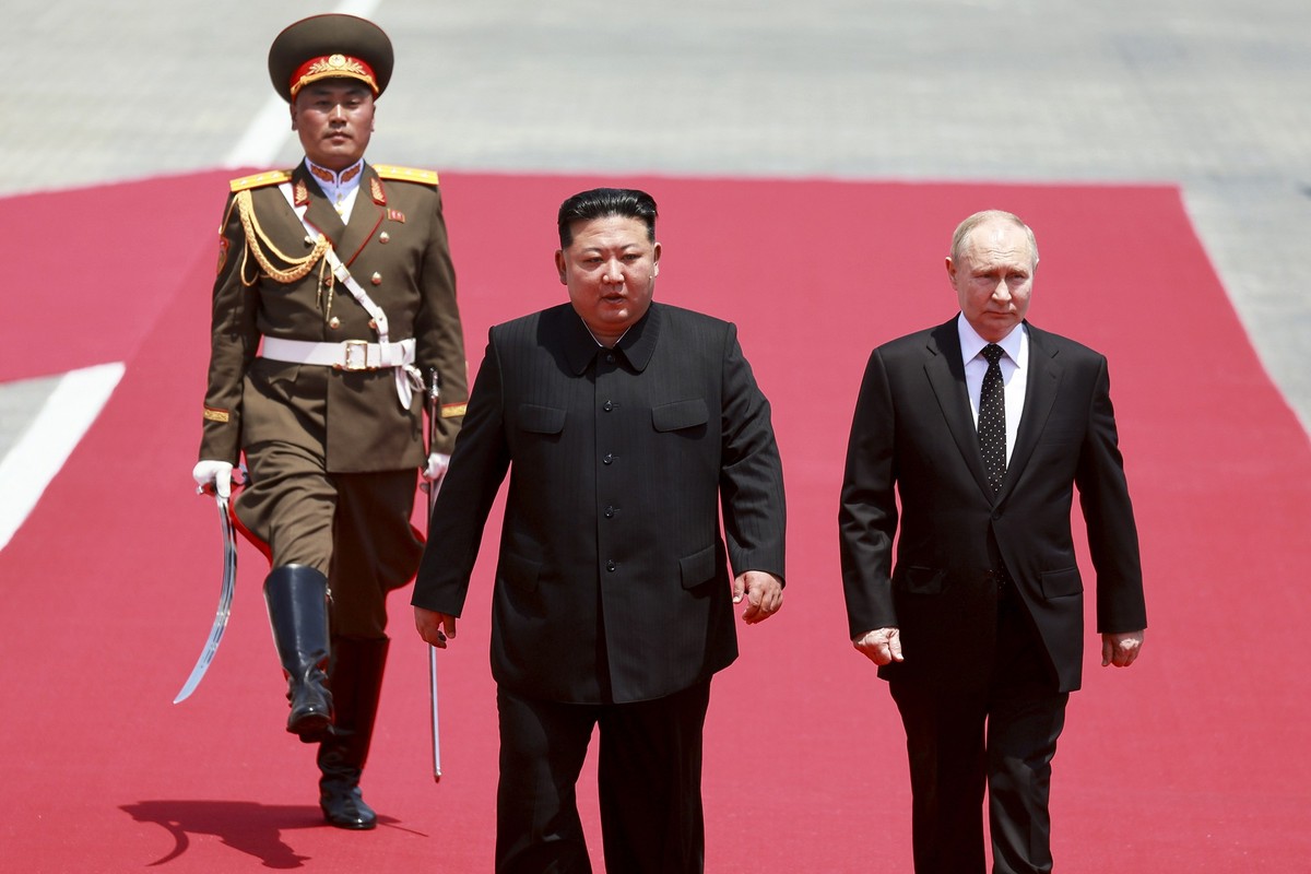 Russian President Vladimir Putin, right, and North Korea&#039;s leader Kim Jong Un attend the official welcome ceremony at the Kim Il Sung Square in Pyongyang, North Korea, Wednesday, June 19, 2024. ( ...
