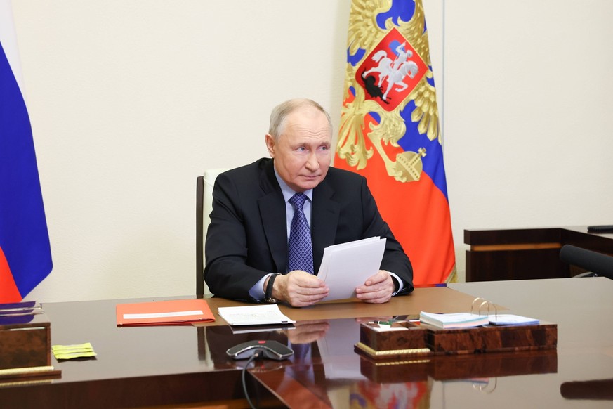 RUSSIA, MOSCOW REGION - FEBRUARY 13, 2024: Russia s President Vladimir Putin chairs a Russian Security Council meeting via a video linkup from Novo-Ogaryovo residence. Sergei Ilyin/Russian Presidentia ...