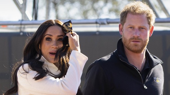 FILE - Prince Harry and Meghan Markle, Duke and Duchess of Sussex visit the track and field event at the Invictus Games in The Hague, Netherlands, Sunday, April 17, 2022. The production company founde ...