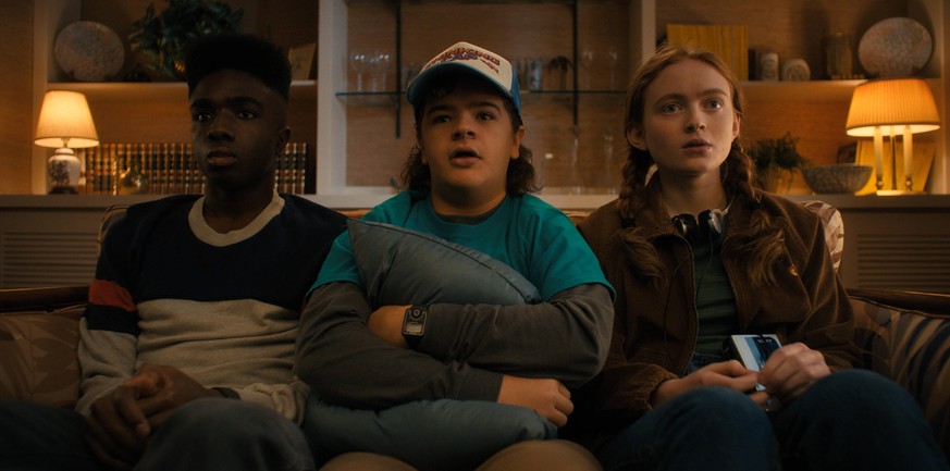 Stranger Things Season 4 2022 L to R Caleb McLaughlin as Lucas Sinclair, Gaten Matarazzo as Dustin Henderson and Sadie Sink as Max Mayfield in Stranger Things Season 4 2022 Photo credit: Netflix PUBLI ...