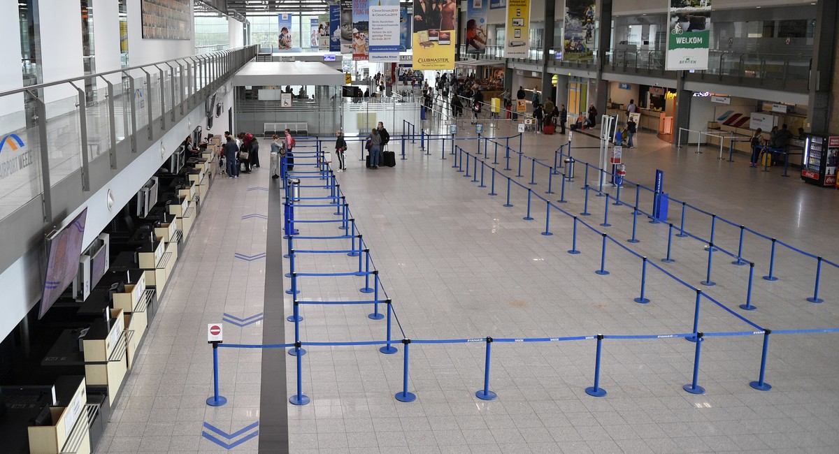 The Ryanair check in counters are empty at the airport in Weeze, Germany, Wednesday, Sept. 12, 2018. Ryanair is canceled flights after pilots and flight attendants started a one-day strike over pay an ...