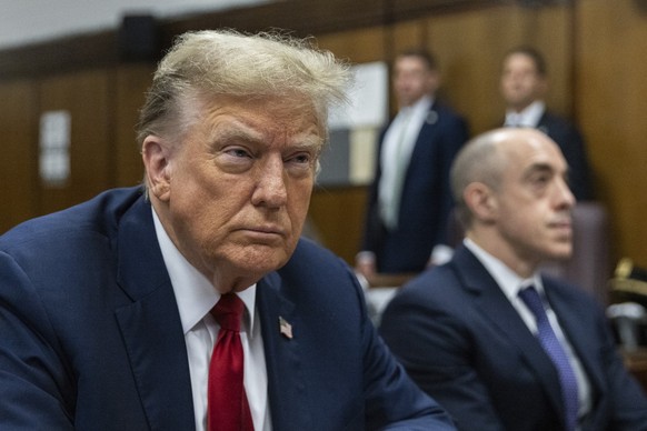 Former President Donald Trump attends jury selection at Manhattan criminal court in New York, on Monday, April 15, 2024, for his trial over charges that he falsified business records to conceal money  ...