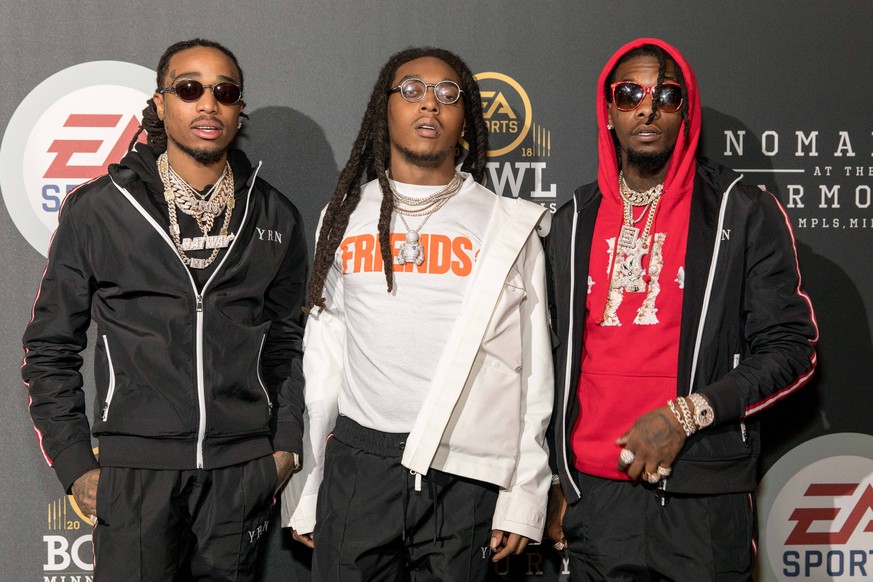 February 1, 2018 - Minneapolis, Minnesota, U.S - QUAVO, TAKEOFF and OFFSET of Migos pose backstage during the EA Sports Bowl at The Armory in Minneapolis, Minnesota Minneapolis U.S. PUBLICATIONxINxGER ...