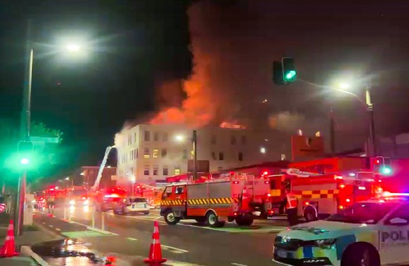 230516 -- WELLINGTON, May 16, 2023 -- This photo taken on May 16, 2023 shows the fire site of a hostel building in downtown Wellington, New Zealand. Several people were killed and up to 30 others were ...