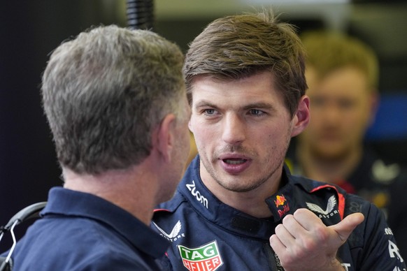 Red Bull driver Max Verstappen of the Netherlands, right, talks to Red Bull team principal Christian Horner during Formula One pre season testings at the Bahrain International Circuit in Sakhir, Bahra ...