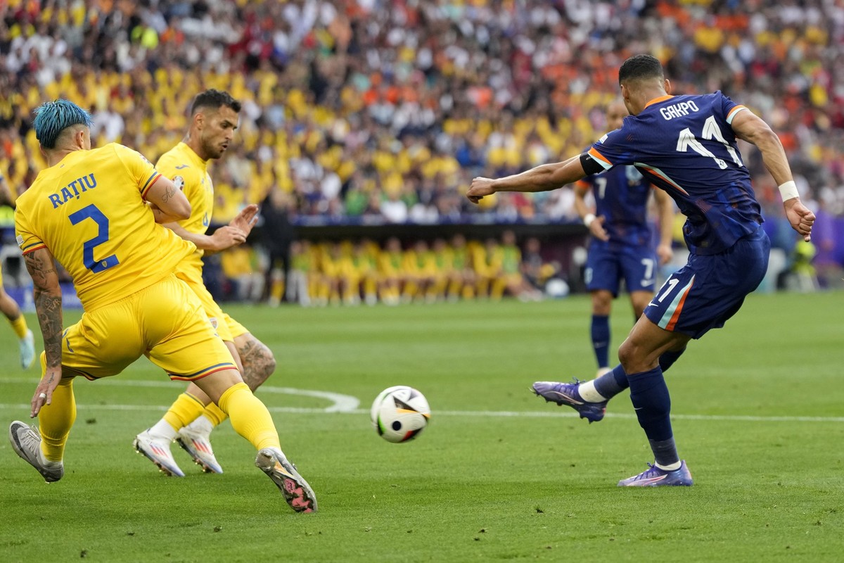 Cody Gakpo of the Netherlands scores the opening goal during a round of sixteen match between Romania and the Netherlands at the Euro 2024 soccer tournament in Munich, Germany, Tuesday, July 2, 2024.  ...