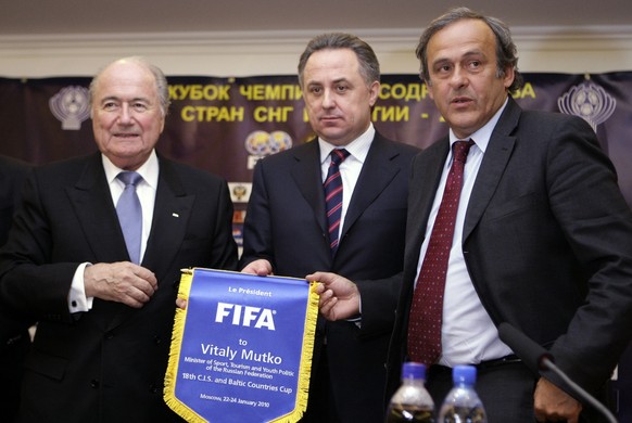 FILE - Then FIFA president Sepp Blatter, Russian Sports Minister Vitaly Mutko, who was the Russian Football Union president in 2005-2009, and then UEFA president Michel Platini are seen in Moscow. For ...