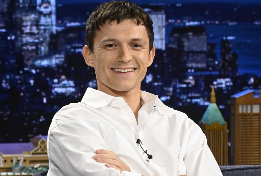 THE TONIGHT SHOW STARRING JIMMY FALLON -- Episode 2038 -- Pictured: Actor Tom Holland during an interview on Tuesday, October 22, 2024 -- (Photo by: Todd Owyoung/NBC via Getty Images)