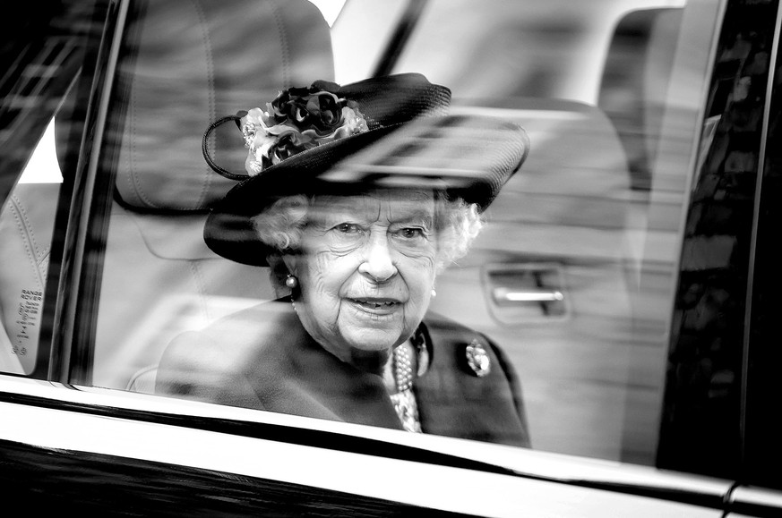 STIRLING, SCOTLAND - JUNE 29: (EDITORS NOTE: THIS IMAGE HAS BEEN CONVERTED TO BLACK AND WHITE) Queen Elizabeth II departs after opening the Argyll and Sutherland Highlanders’ Museum during a visit to  ...