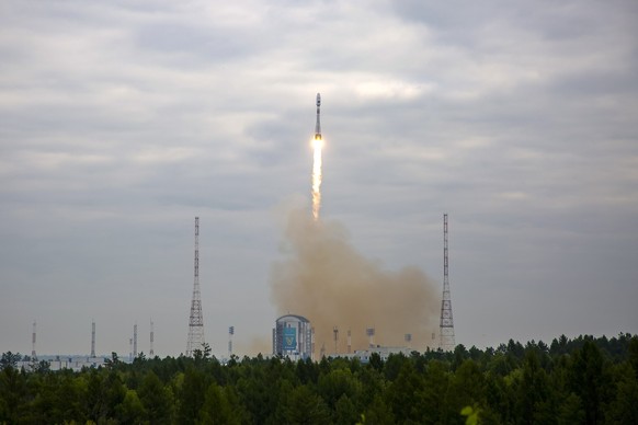 In this photo released by Roscosmos State Space Corporation, the Soyuz-2.1b rocket with the moon lander Luna-25 automatic station takes off from a launch pad at the Vostochny Cosmodrome in the Russia& ...