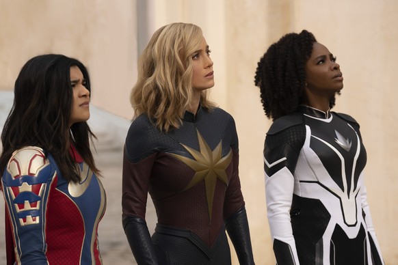 This image released by Disney shows, from left, Iman Vellani as Ms. Marvel, Brie Larson as Captain Marvel, and Teyonah Parris as Captain Monica Rambeau in a scene from &quot;The Marvels.&quot; (Laura  ...
