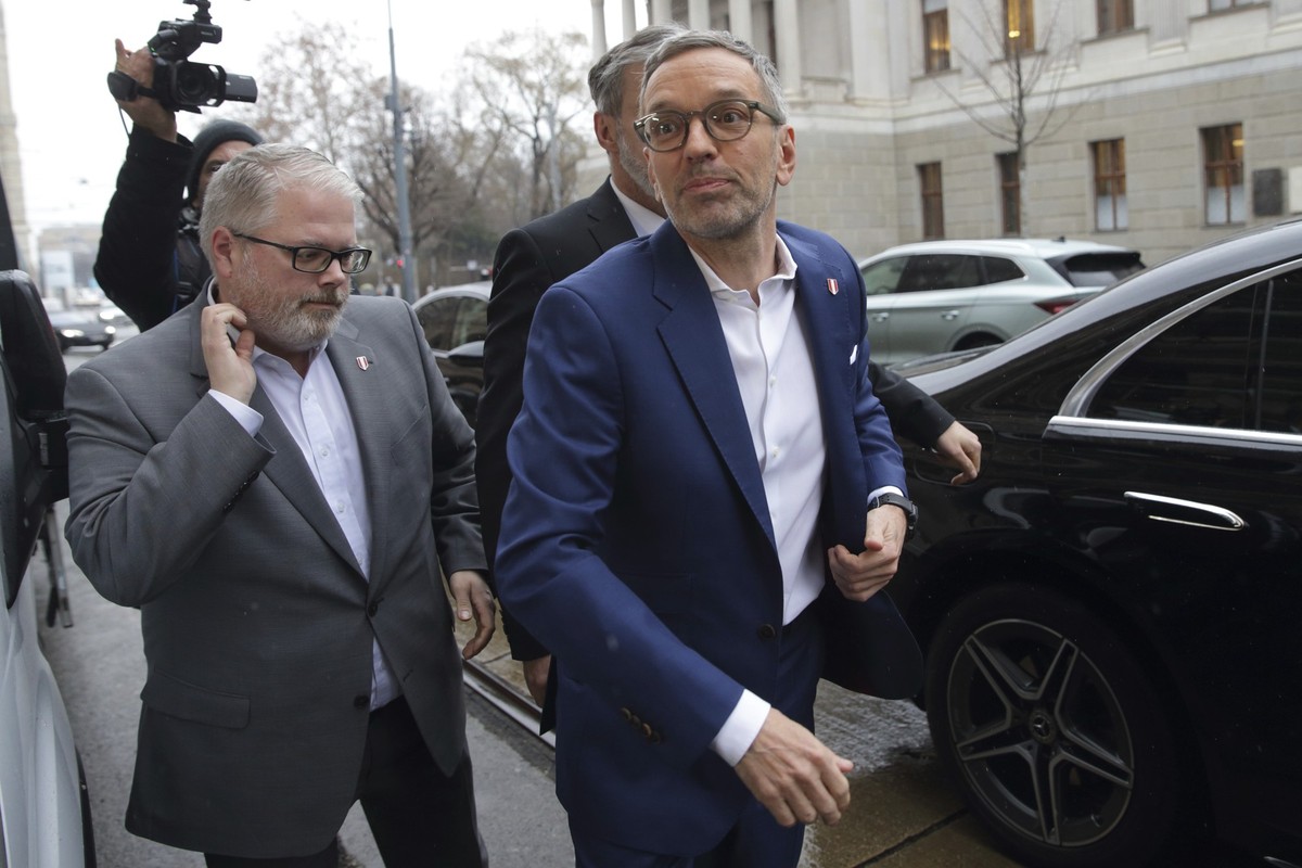 The leader of Austria's Freedom Party, Herbert Kickl, arrives at his party's headquarters in Vienna, Austria, Wednesday, Feb. 12, 2025. (AP Photo/Heinz-Peter Bader)