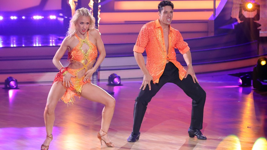 COLOGNE, GERMANY - APRIL 22: Rene Casselly and Kathrin Menzinger perform on stage during the 8th show of the 15th season of the television competition show &quot;Let&#039;s Dance&quot; at MMC Studios  ...