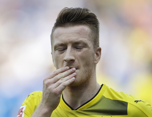 Dortmund&#039;s Marco Reus reacts during a German first division Bundesliga soccer match between TSG 1899 Hoffenheim and Borussia Dortmund in Sinsheim, Germany, Saturday, May 12, 2018.(AP Photo/Michae ...