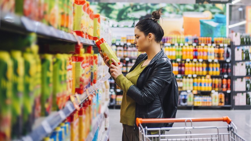 A young woman, housewife, decided to go to the supermarket and buy groceries for his family. the will to cook breakfast, lunch, dinner and everything she wrote on her shopping list. She chooses, fruit ...