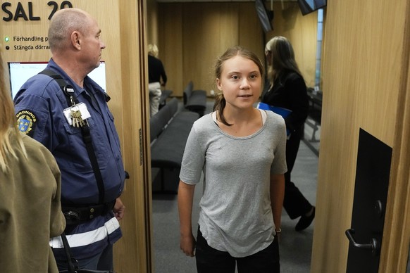 Climate activist Greta Thunberg of Sweden leaves a court room after a hearing in Malmo, Sweden, Monday, July 24, 2023. Climate activist Greta Thunberg appears in court on Monday charged with disobeyin ...