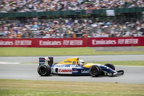 Formula 1 2022: British GP SILVERSTONE CIRCUIT, UNITED KINGDOM - JULY 03: Sebastian Vettel, Aston Martin, drives his ex-Nigel Mansell Williams FW14B Renault, running on carbon neutral fuel during the  ...