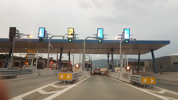 toll station in afternoon light in Ioania highway Gorgomilos greece