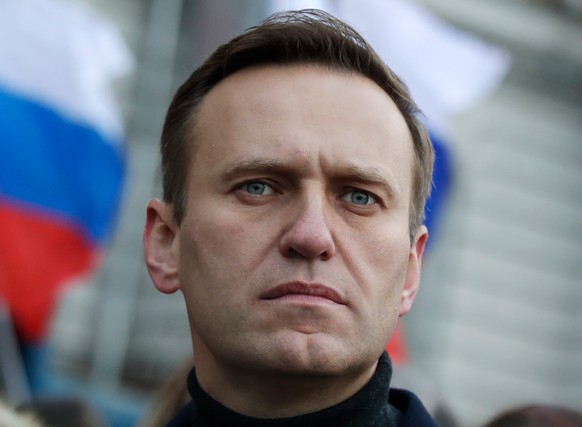 ARCHIV - 29.02.2020, Russland, Moskau: Der am 16. Februar in einem russischen Straflager gestorbene Oppositionsführer Alexej Nawalny bei einem Gedenkmarsch für den 2015 ermordeten Kremlkritiker Boris  ...