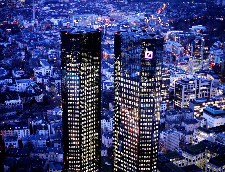 FILE - The Feb. 1, 2018 file photo shows the towers of the Deutsche Bank in Frankfurt, Germany, Thursday. Deutsche Bank will present the figures of the first quarter 2018 on Thursday, April 26, 2018.  ...