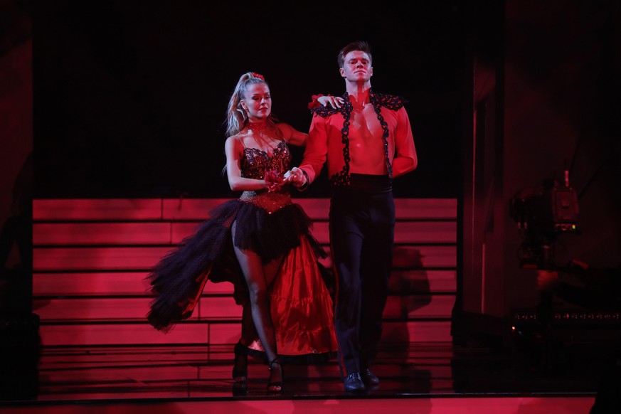 COLOGNE, GERMANY - MARCH 26: Simon Zachenhuber and Patricija Belousova perform on stage during the 5th show of the 14th season of the television competition &quot;Let&#039;s Dance&quot; on March 26, 2 ...