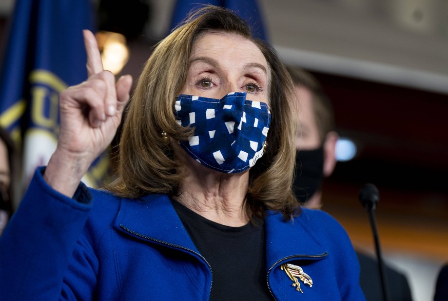 Speaker of the House Nancy Pelosi, D-CA, speaks at a press conference while surrounded by House impeachment managers at the U.S. Capitol in Washington, D.C. on Saturday, February 13, 2021. Former Pres ...