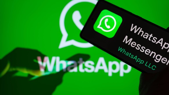 WhatsApp Illustration WhatsApp mobile app displayed on phone with WhatsApp on screen in this photo illustration. On 26 January 2023 in Brussels, Belgium. Photo illustration by Jonathan Raa/NurPhoto Br ...